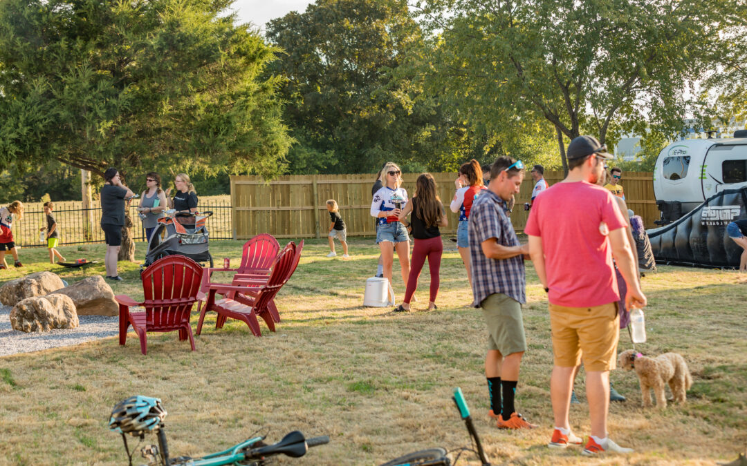 Guests and riders hanging out in the backyard at The Bike Inn, Bentonville
